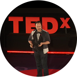 A photo about Benny as a TED speaker